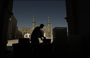 An election worker sorts out election materials at the Friday Mosque which is to be used as a polling station in Herat, Afghanistan, Wednesday, Aug. 19, 2009. Afghans will head to the polls on Aug. 20 to elect a new president. (AP Photo/Saurabh Das)